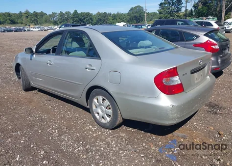 2003 Toyota Camry Le z USA, uszkodzony, nr VIN 4T1BE32K13U123714